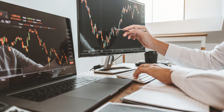Investment stock market Entrepreneur Business team discussing and analysis graph stock market trading,stock chart concept